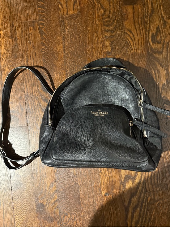 kate spade Handbags - kate spade black pebbled leather mini backpack with gold logo